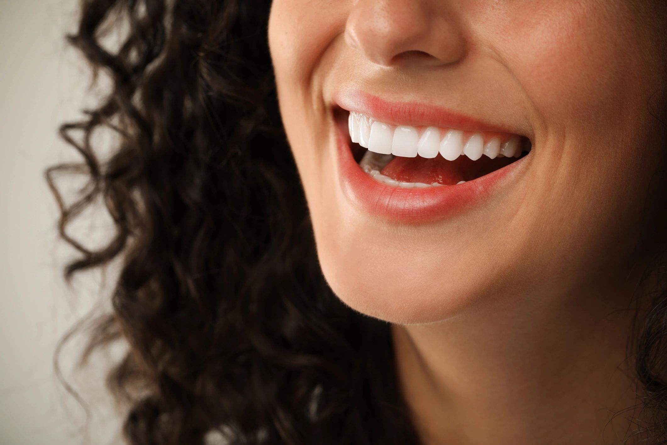 Patient smiling after cosmetic dental treatment